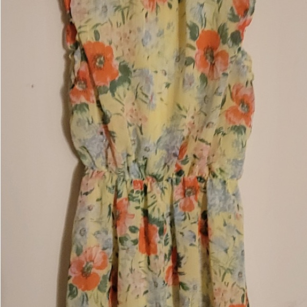 Sienna Sky Vibrant Floral dress with hints of silver that giive some sparkle!